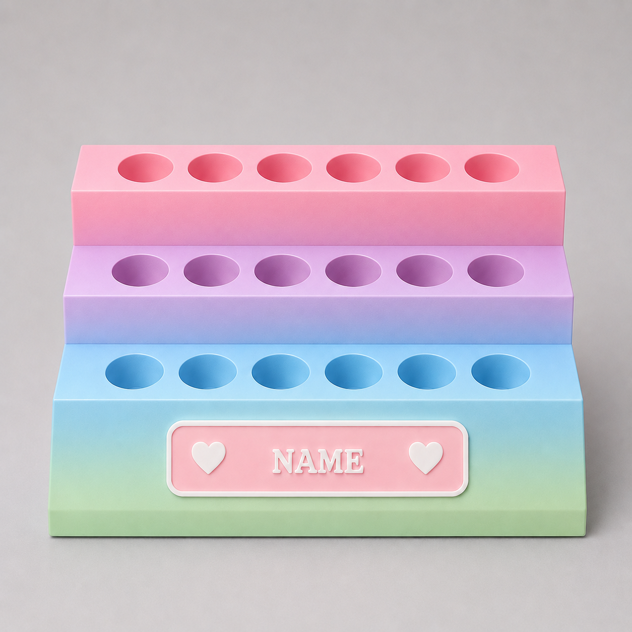 Gradient pink to blue holder with 'NAME' label on a gray background
