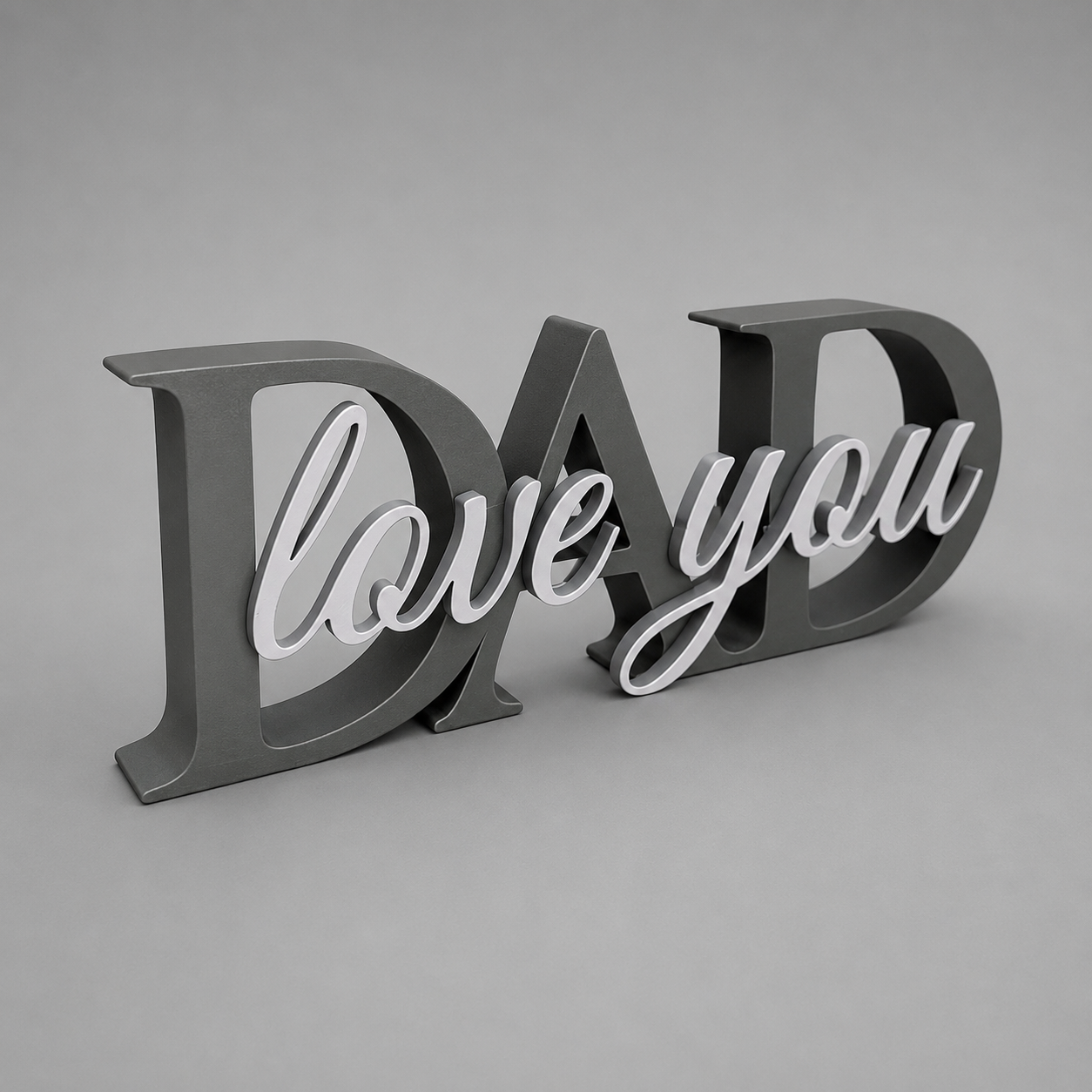 3D text 'DAD love you' on a gray background