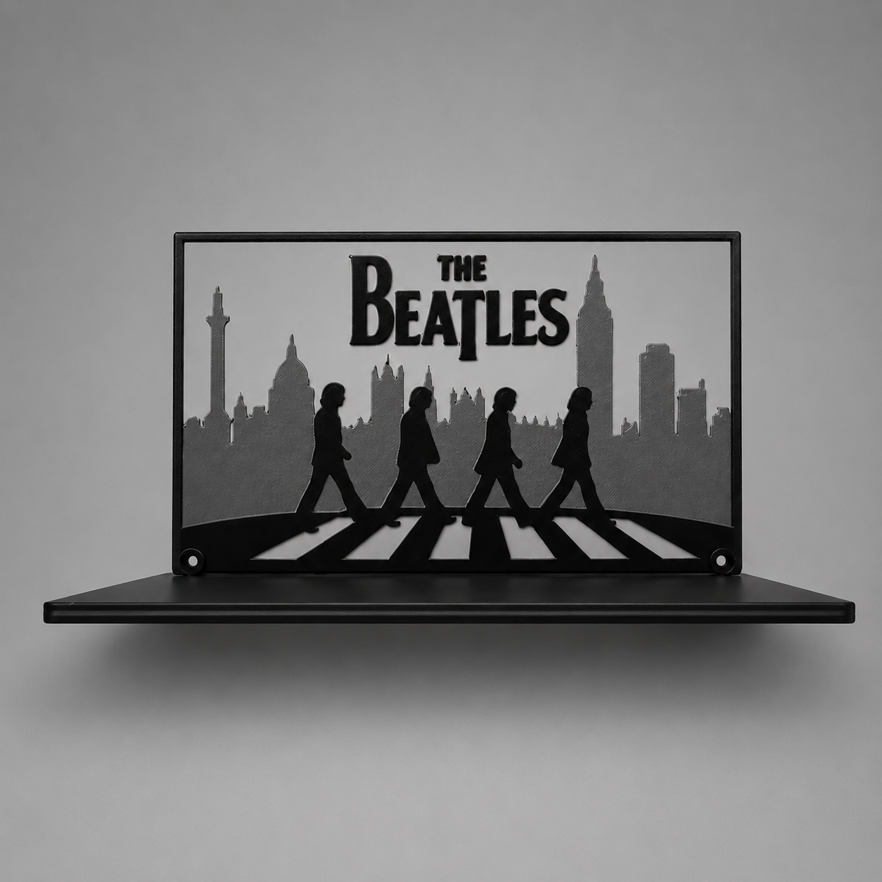 Decorative wall art of The Beatles Abbey Road silhouette on a gray background