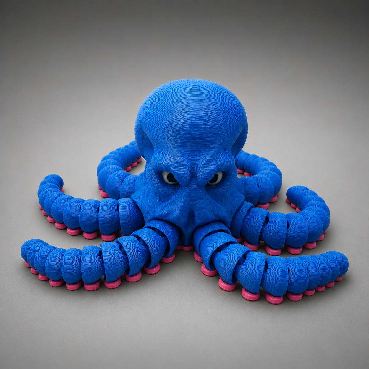 Articulated Octopus figure in blue on white background