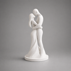 White sculpture of two people embracing on a gray background