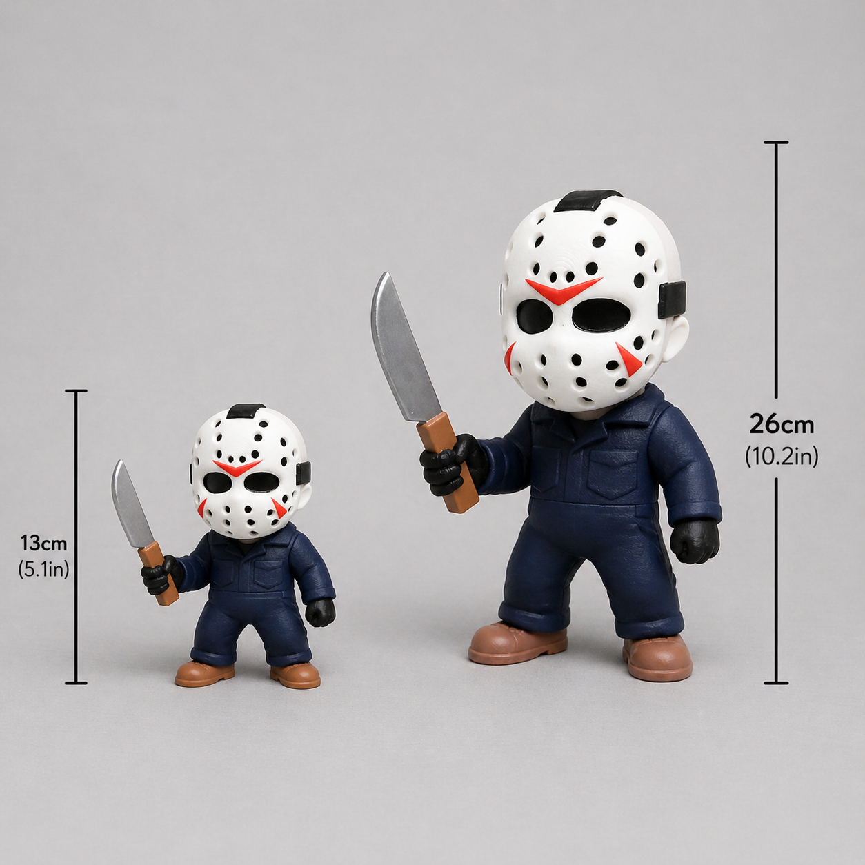 Two action figures with hockey masks and knives, one larger than the other, on a gray background with measurements indicated.