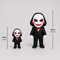 Two toy figures in black suits with white faces and red eyes, accompanied by measurements on a light gray background.
