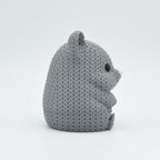 Gray knitted mouse toy on a white background