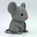 Gray knitted mouse toy on a white background