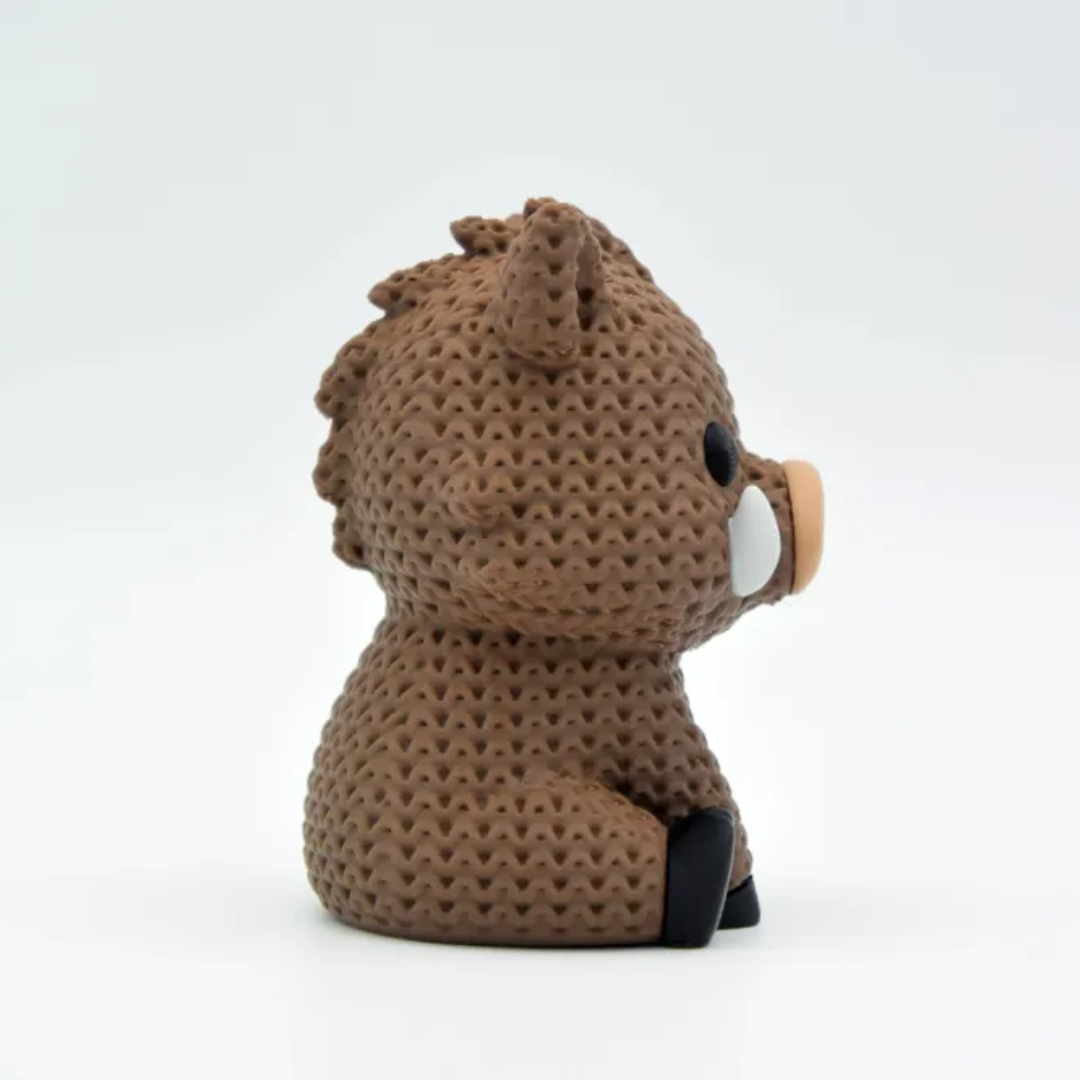 Brown textured plush toy on a white background