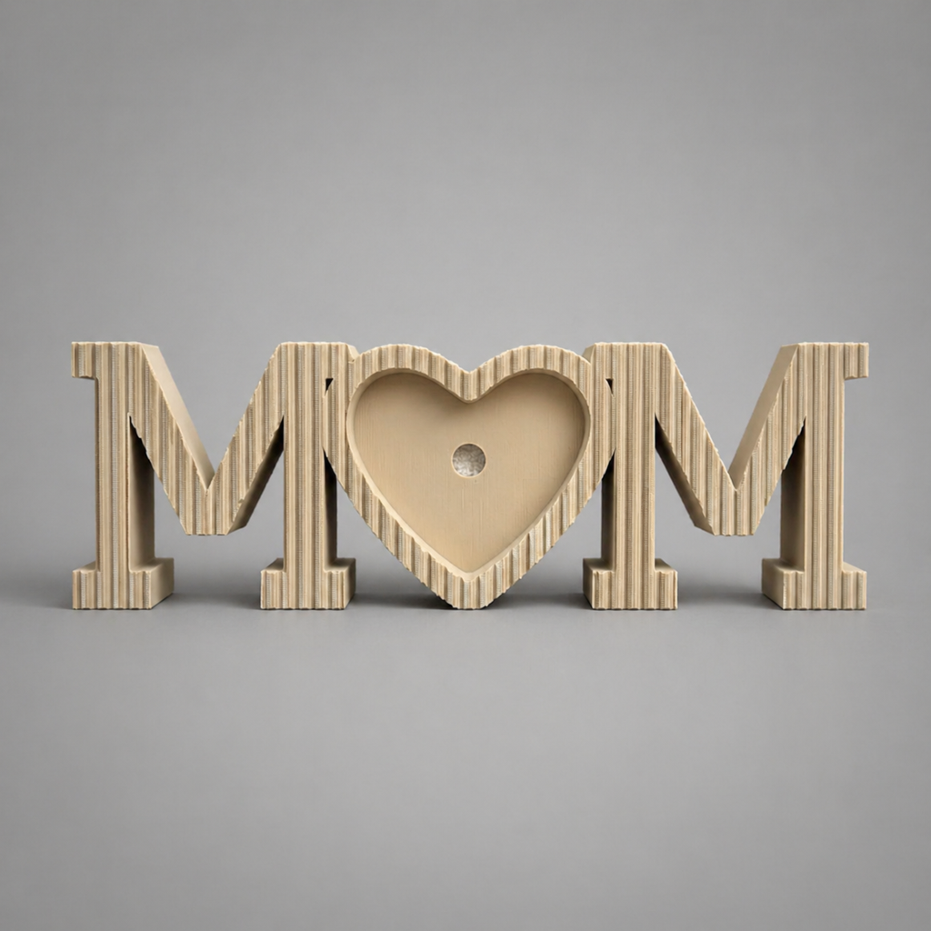 Wooden letters spelling 'MOM' with a heart in the middle on a gray background