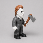 Action figure holding an axe on a gray background