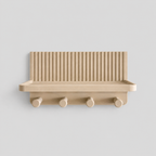 Beige wall-mounted shelf with four hooks on a light gray background
