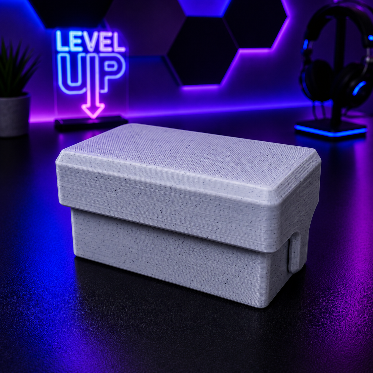 Gray rectangular box on a dark surface with a neon 'Level Up' sign in the background
