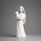 White ceramic statue of a mother holding a child against a gray background