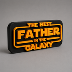 Decorative sign with 'The Best Father in the Galaxy' text on a gray background